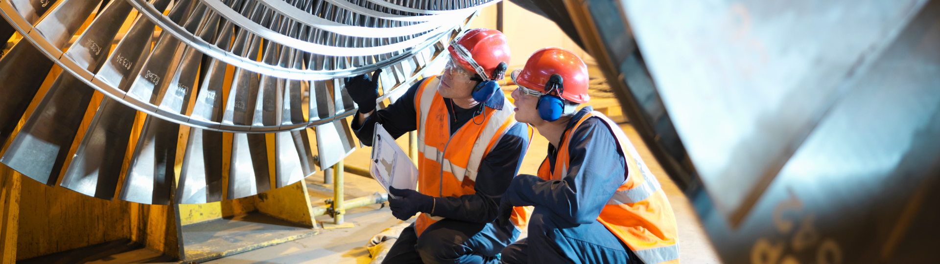 Two engineers inspecting an installation