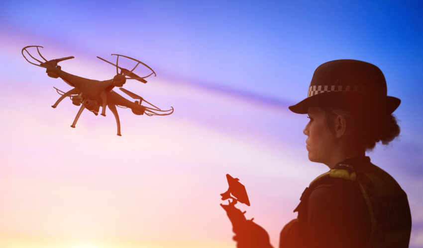 British police office operating a drone