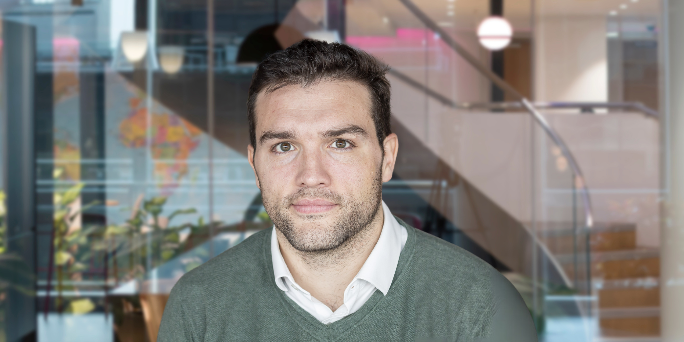Professional headshot of Andrew Wilkie, a Baringa expert, smiling