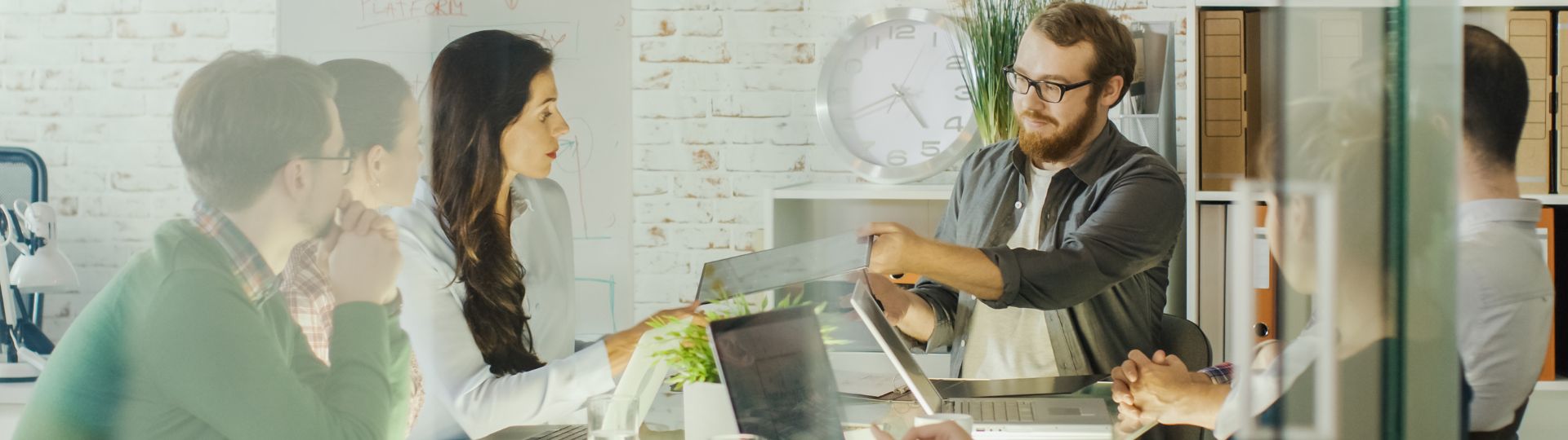 A casual meeting over laptops and smart devices 