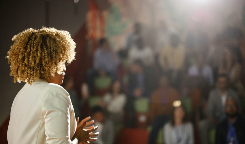 Woman speaking at an event