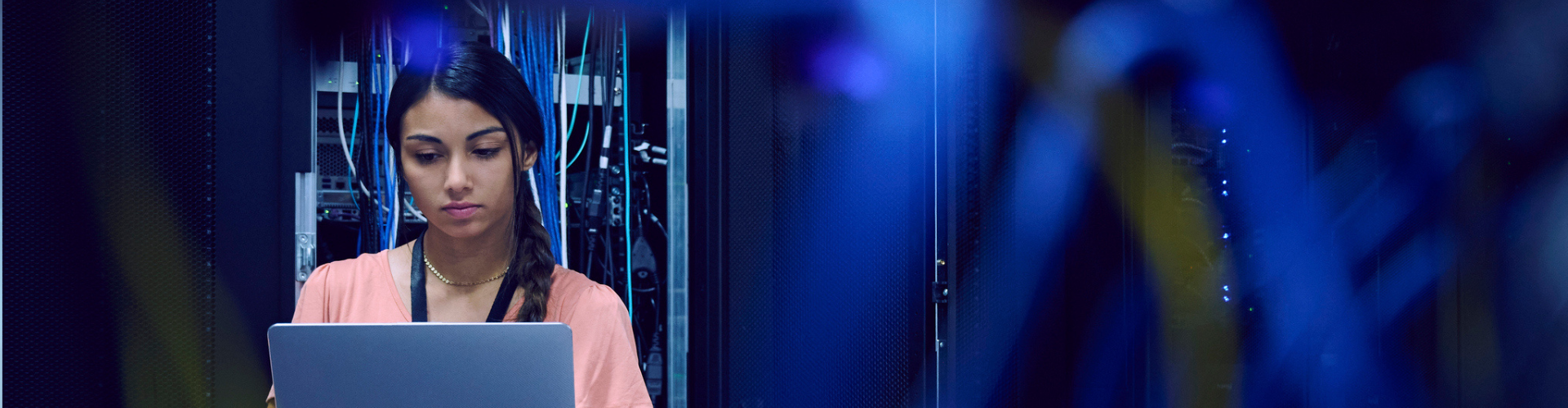 Young woman working in a data centre