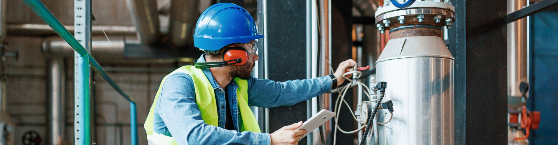 Engineer inspecting machinery