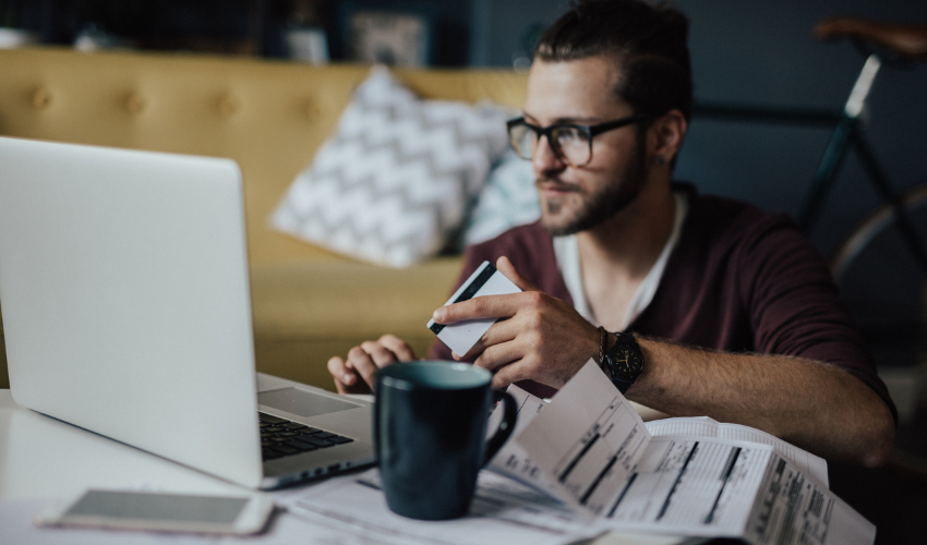 Man looking at his bills