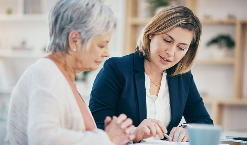 Two women engaged in a serious conversation