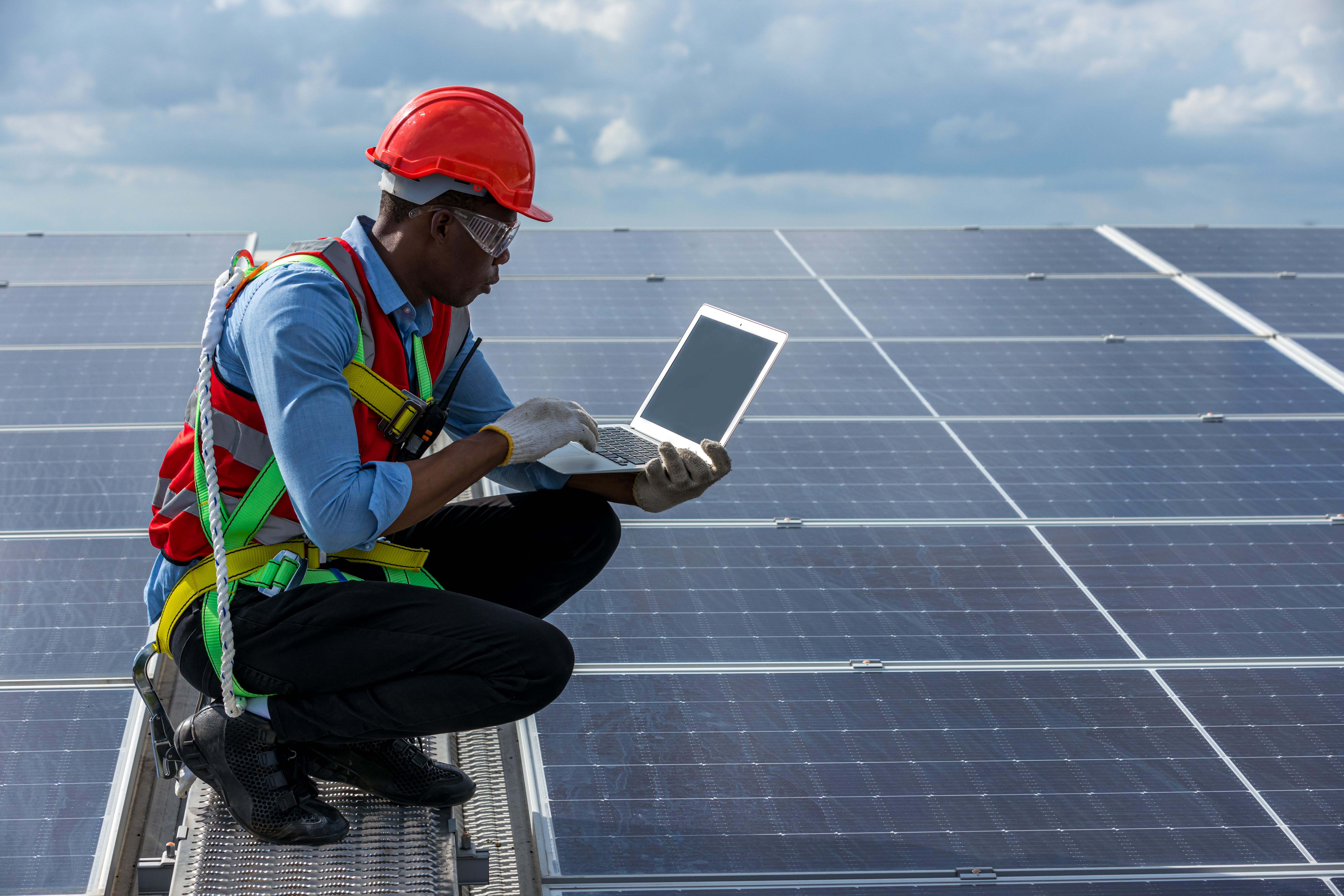 Engineer working on a solar panel