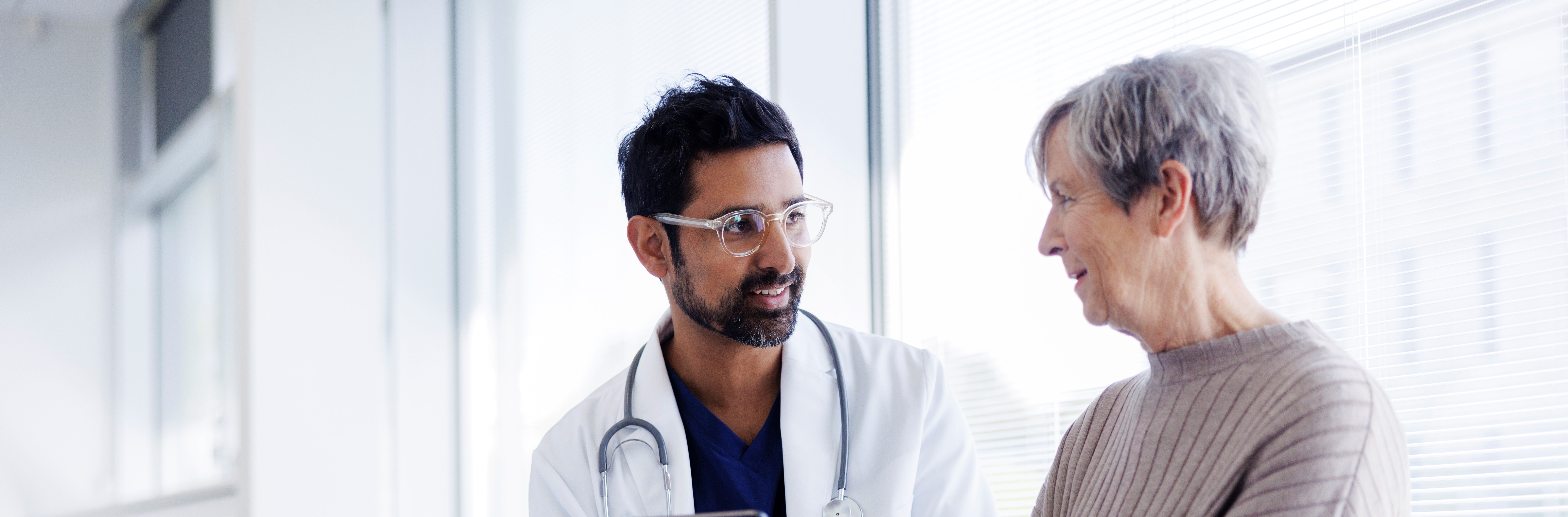 A doctor and a patient talking together