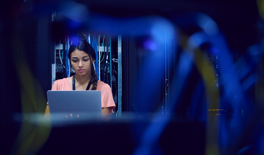 Young woman working in a data centre