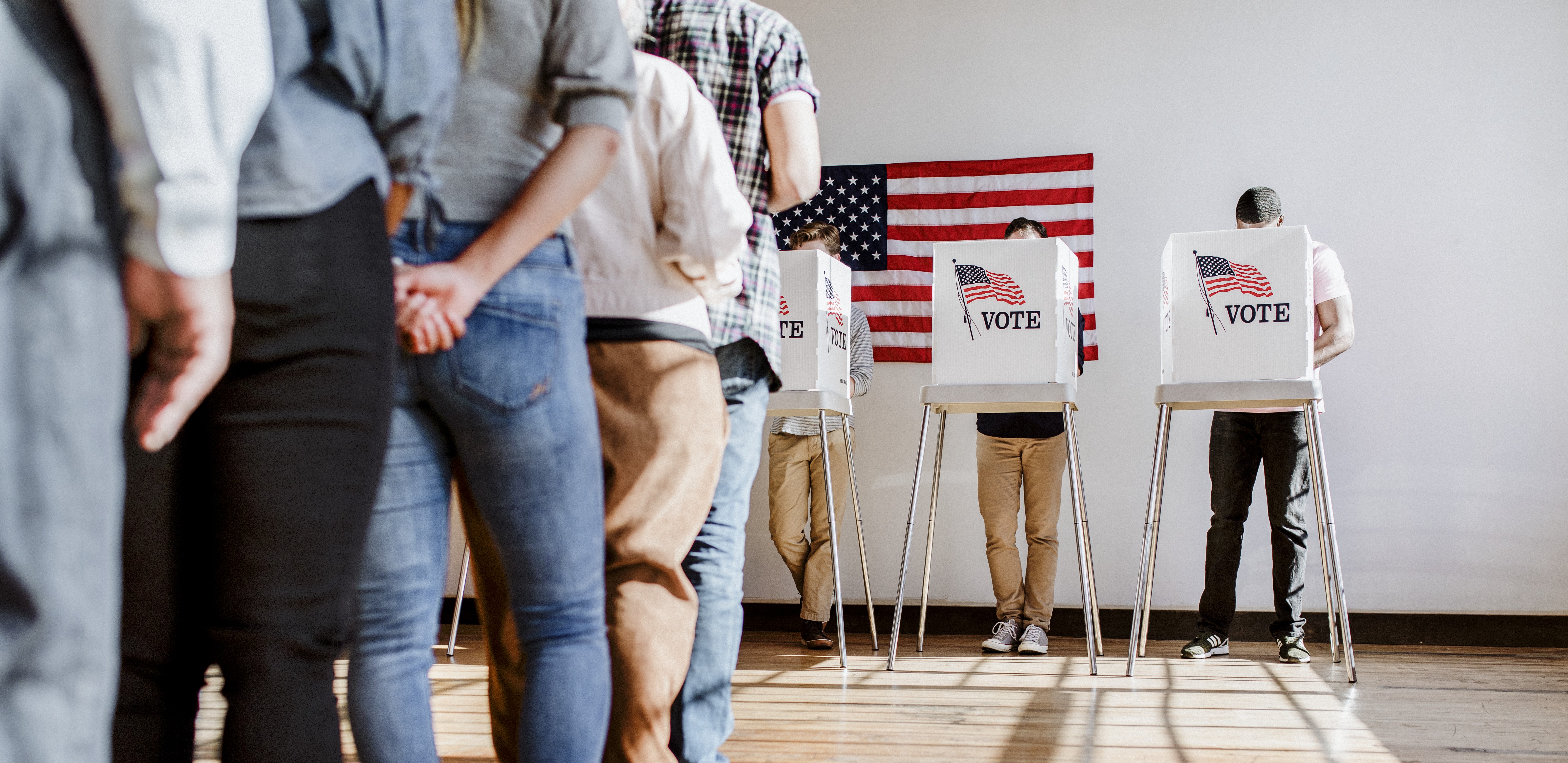 People queuing to vote in an American polling station