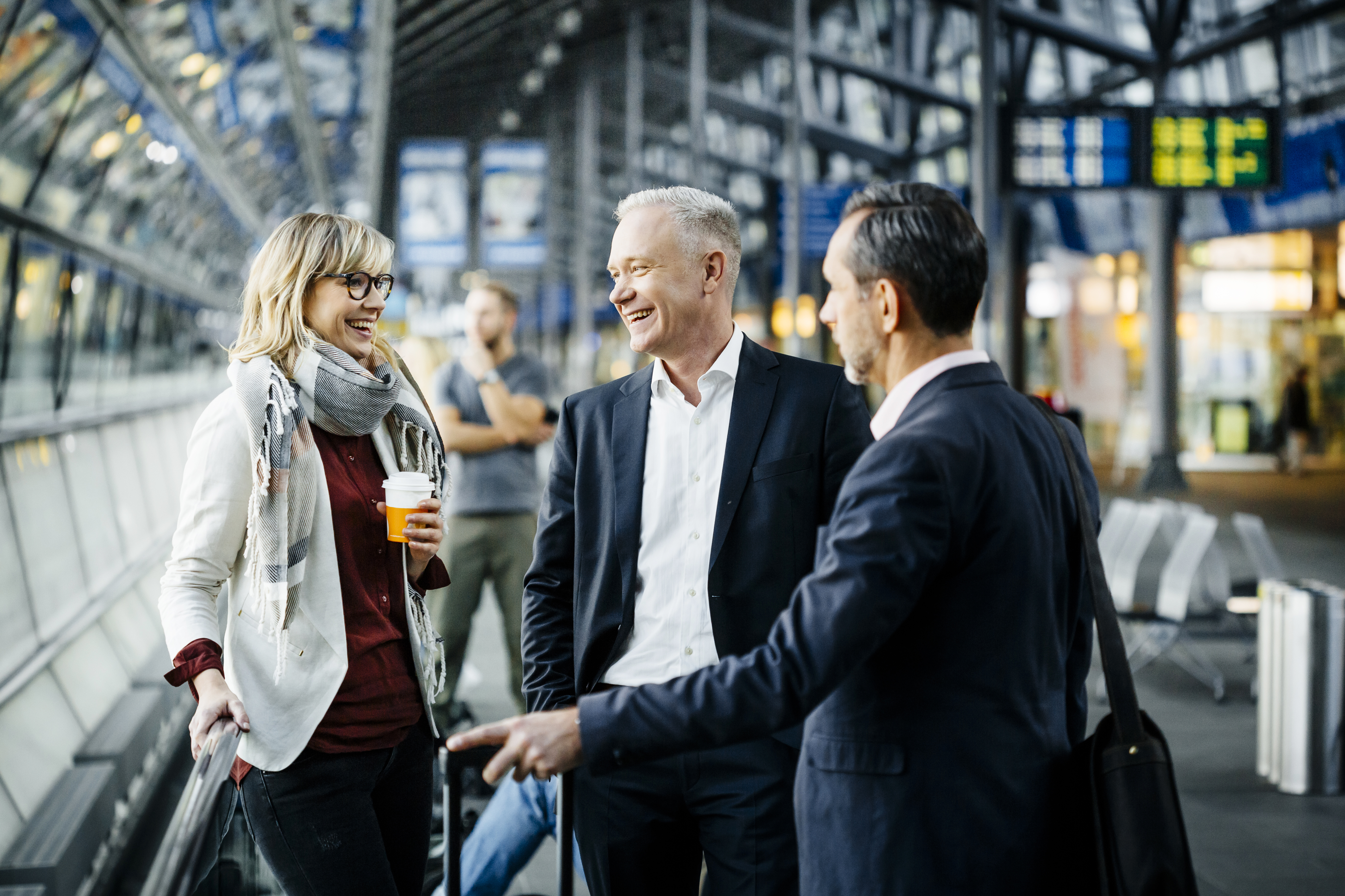Professionals meeting at a train station