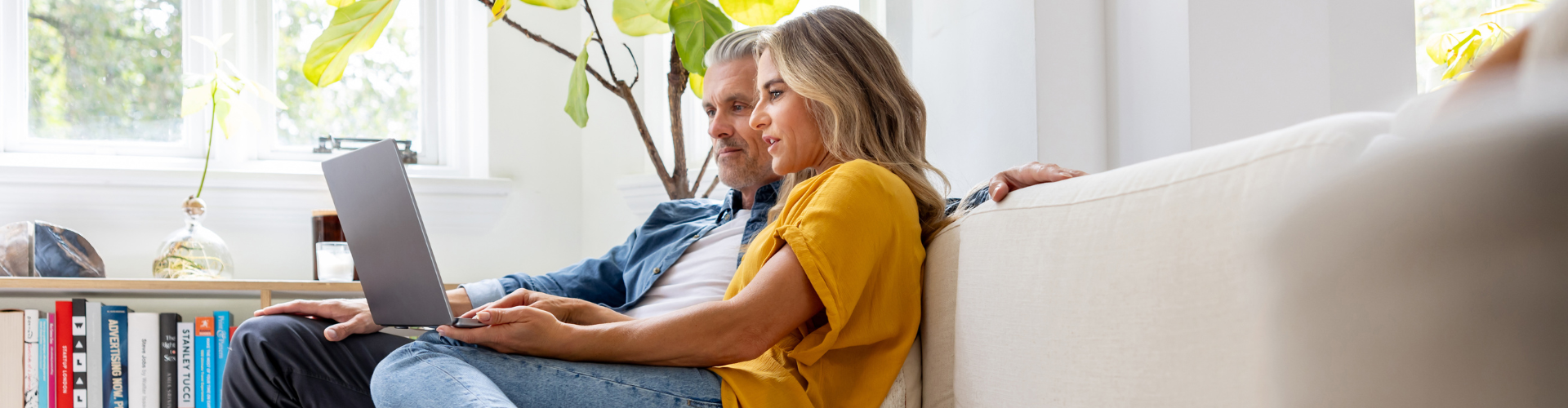 Couple looking at laptop