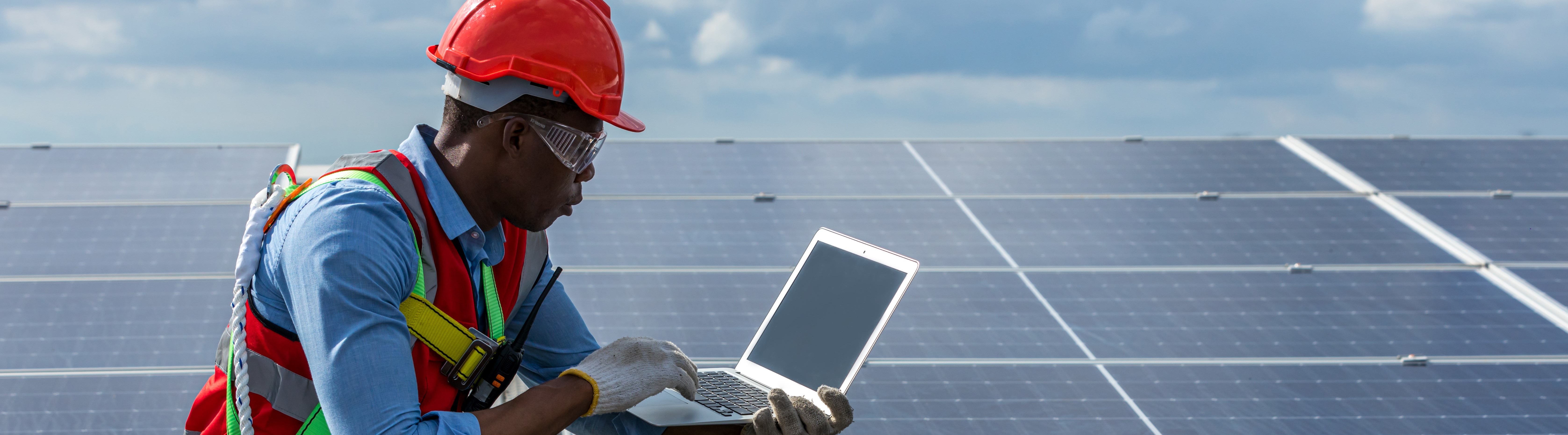 engineer installing solar panels
