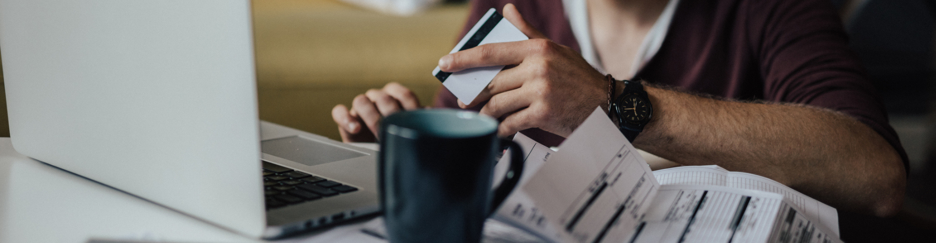 Man looking at his bills