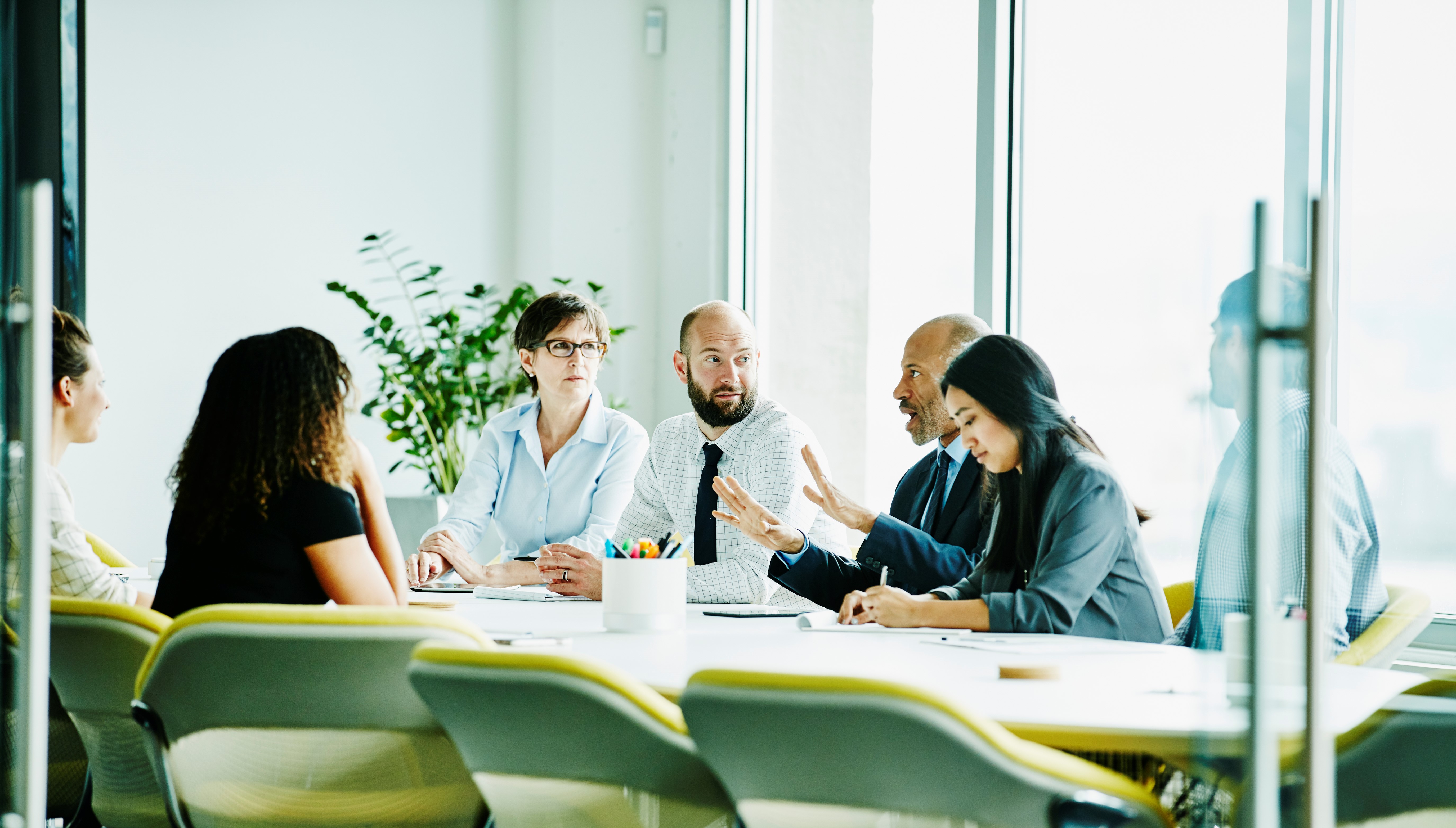 People having a discussion in a meeting room