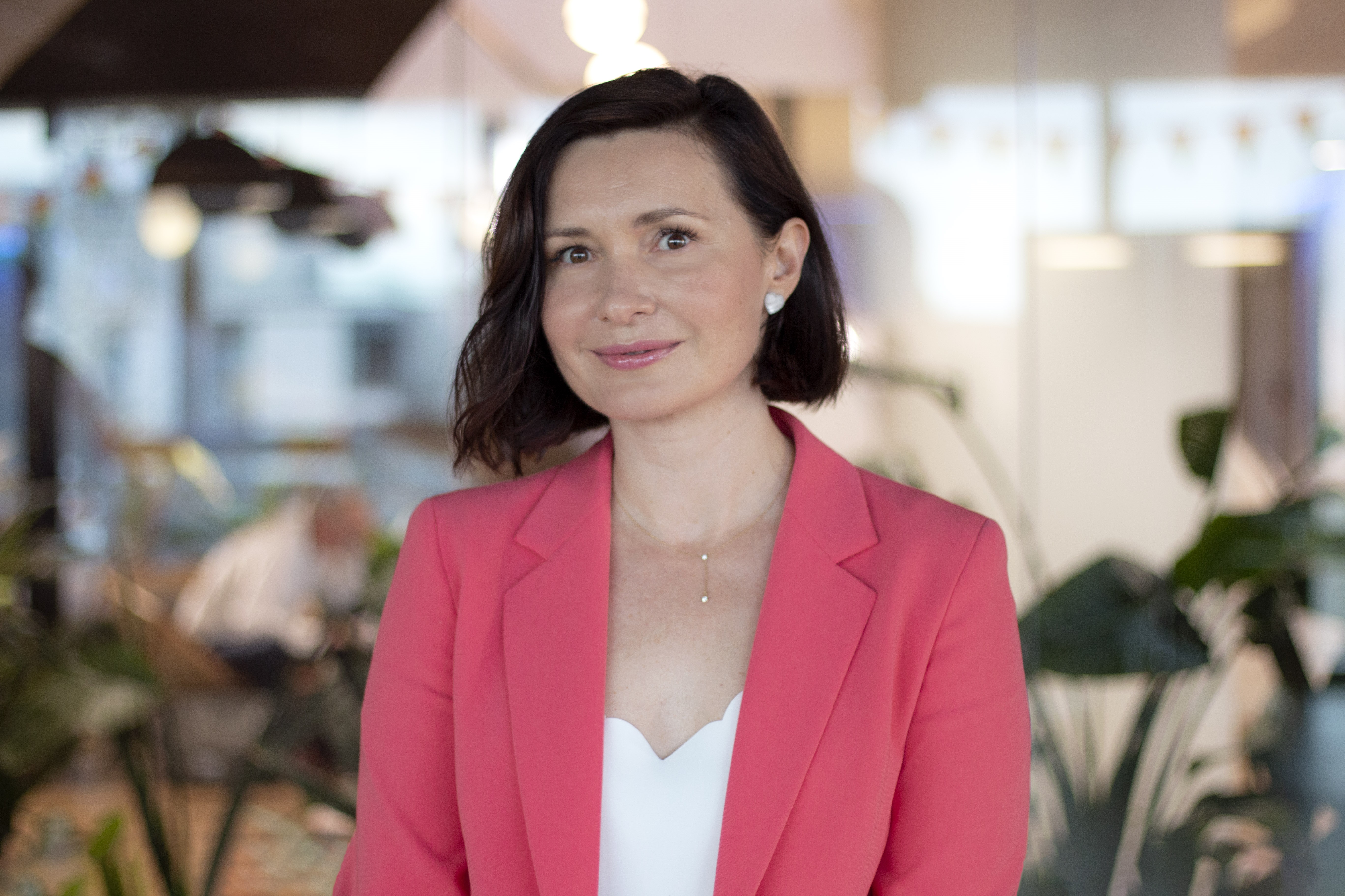 A professional headshot of Olena Isaieva