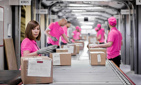 Workers in a logistics facility