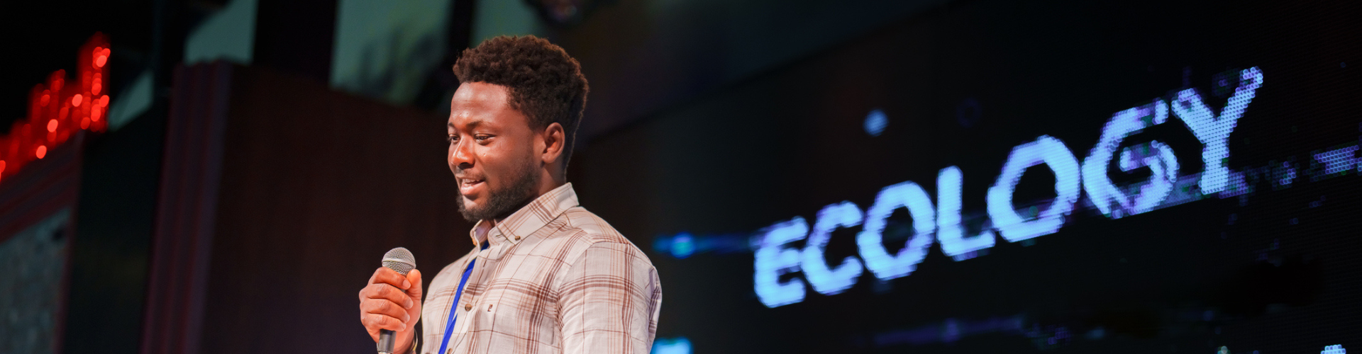 Expert giving a speech at a conference