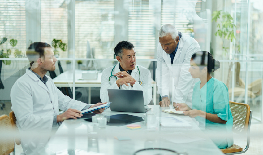 Lab workers in a meeting