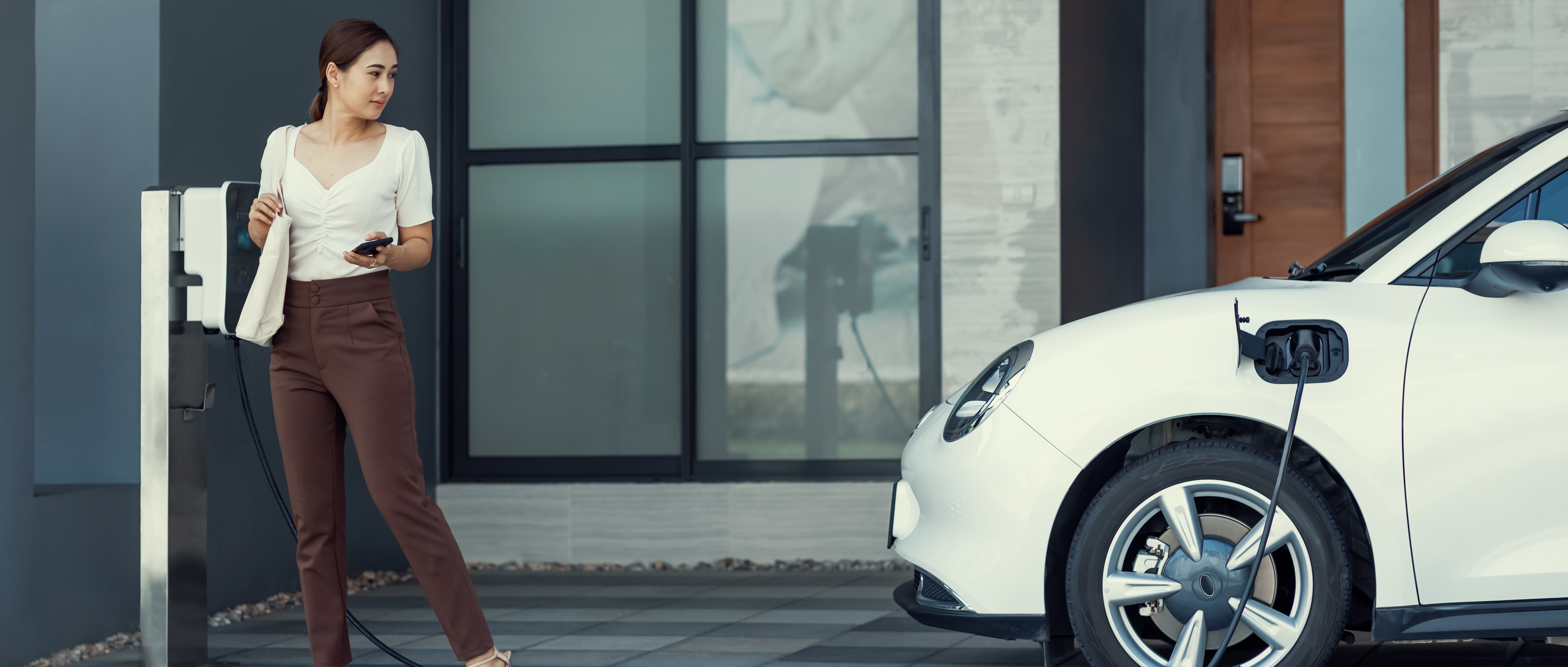 woman charging virtual car