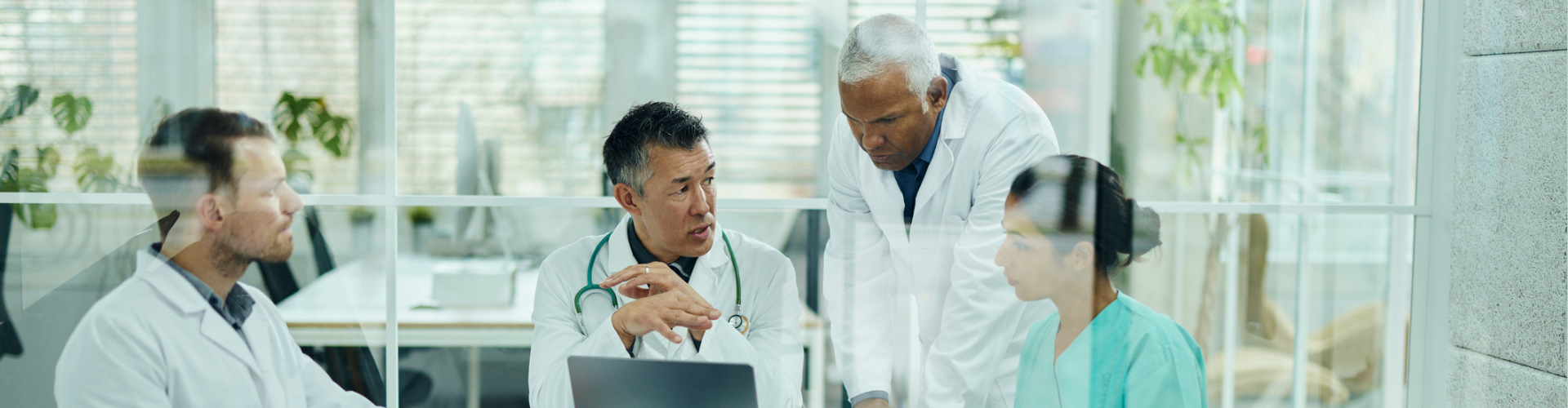 Lab workers in a meeting