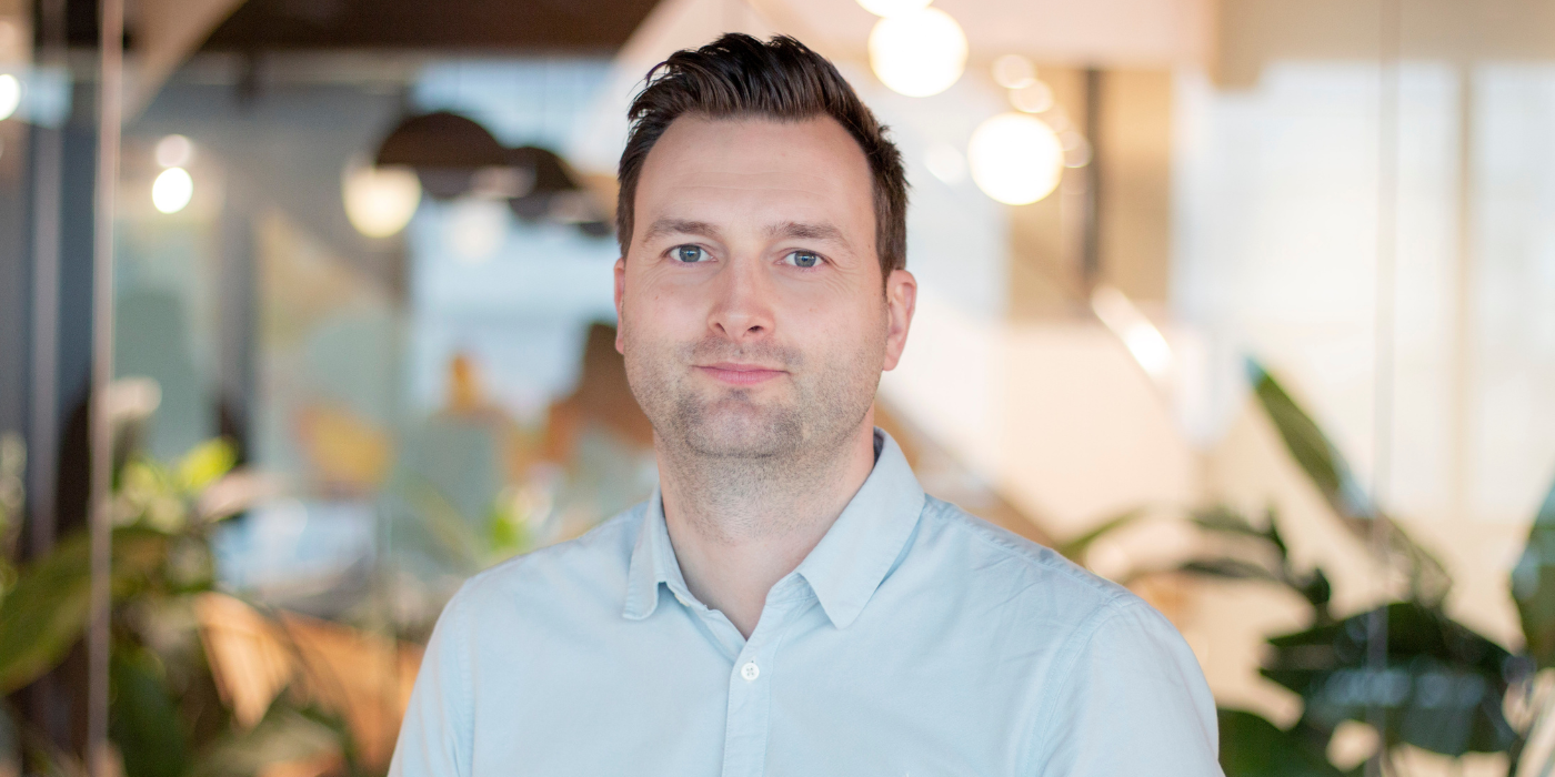 A professional headshot of Gavin Vollmer