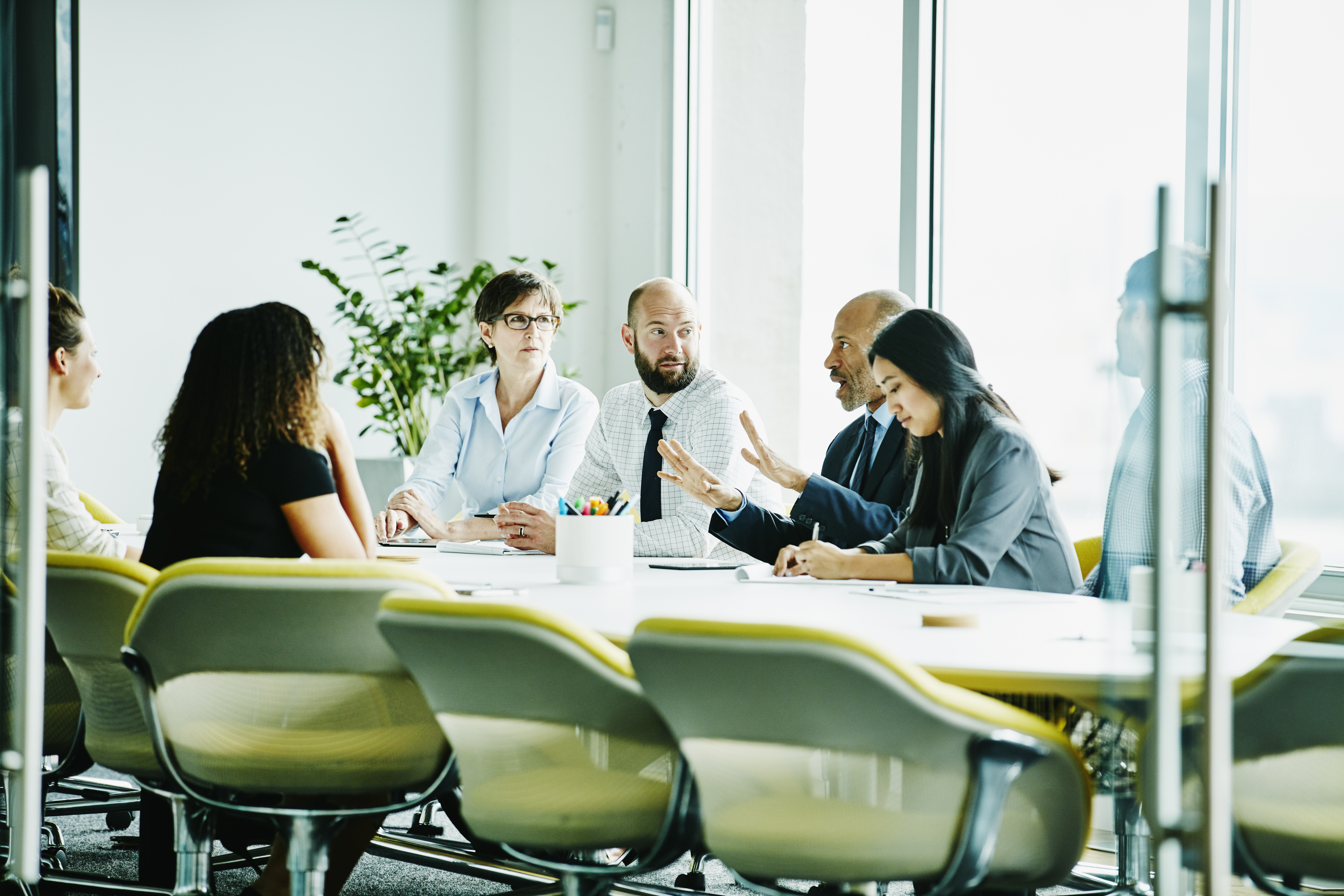 People having a discussion in a meeting room