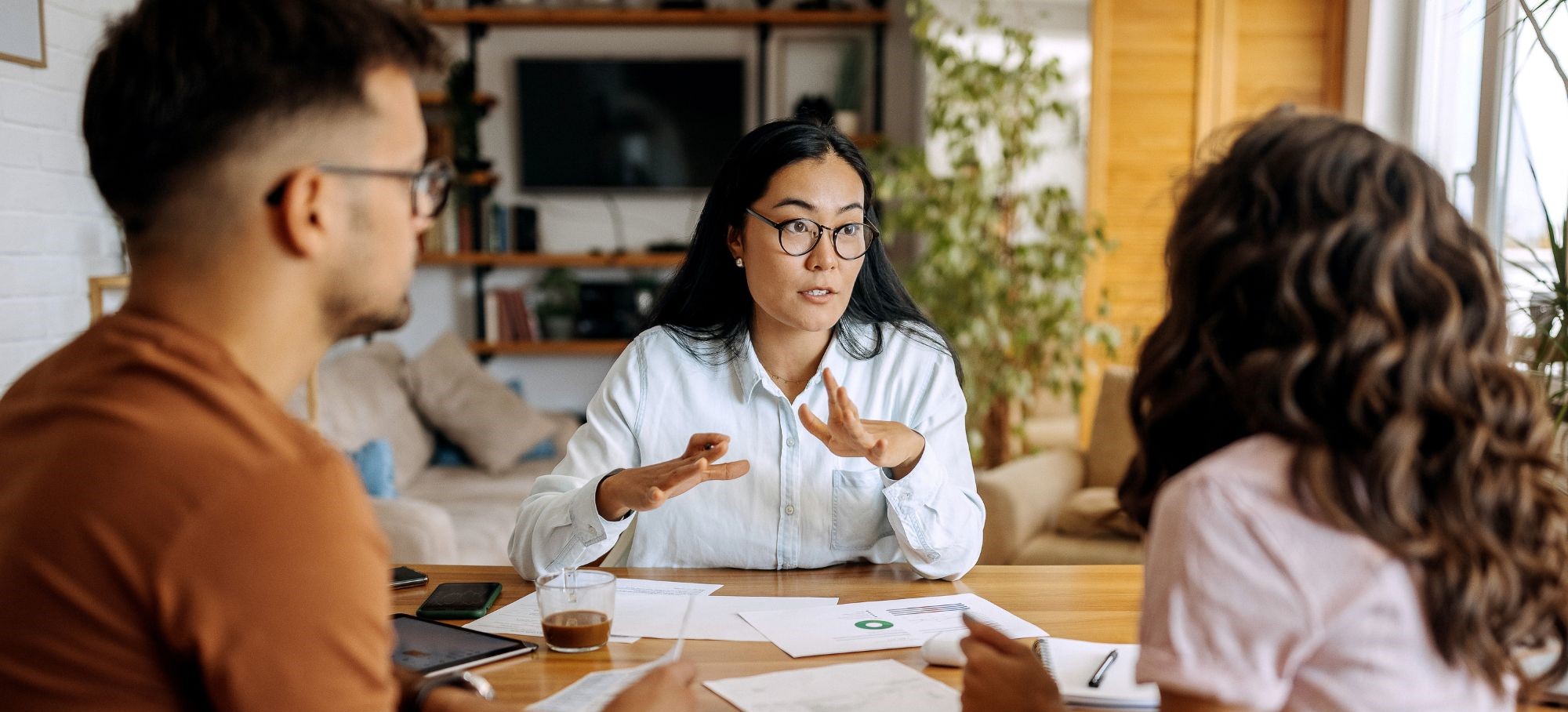 Young couple getting advice from financial expert