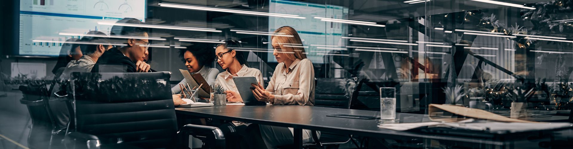 Team working in front of laptops