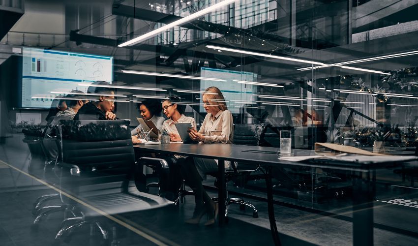 Team working in front of laptops