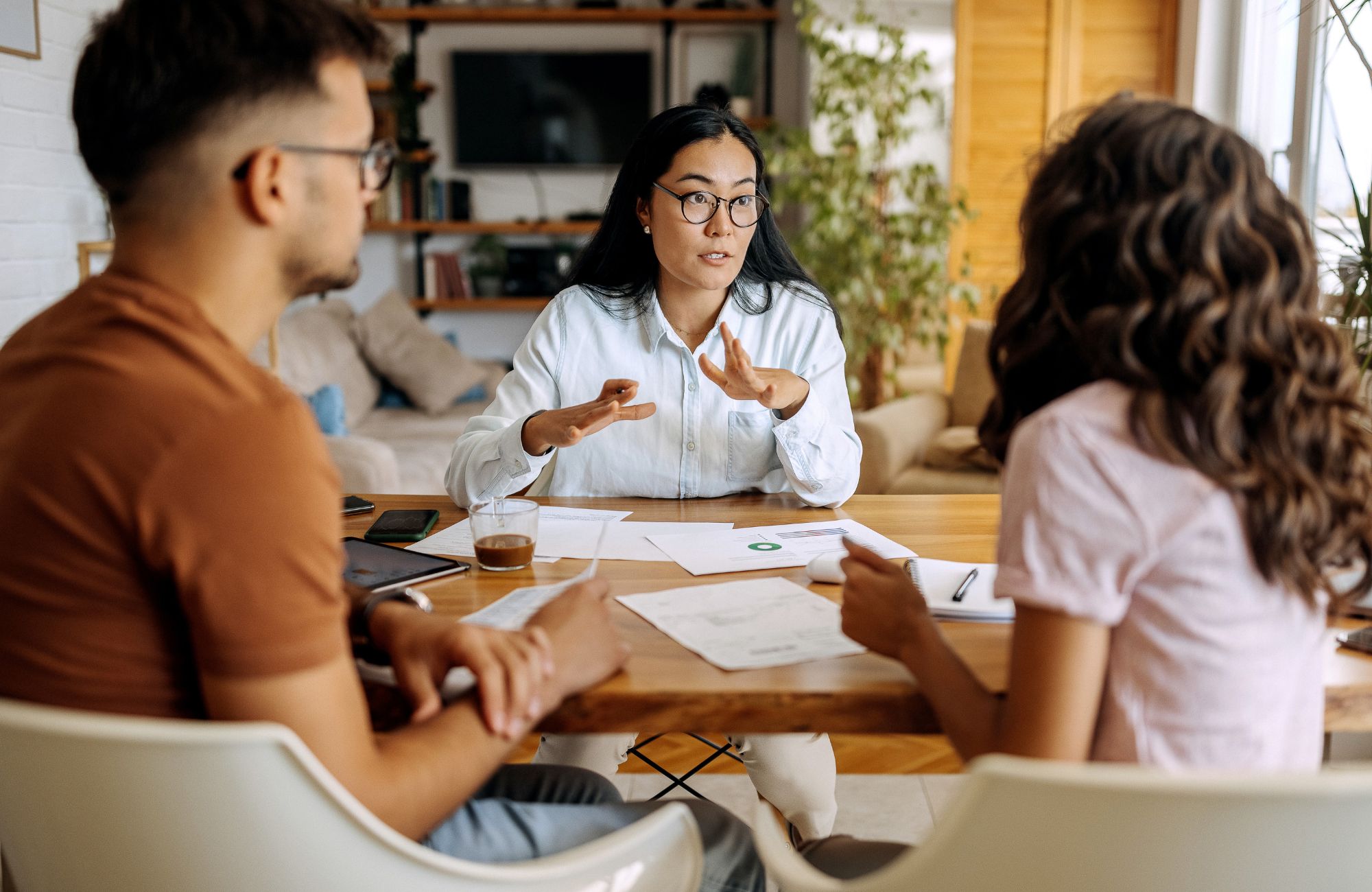 Young couple getting advice from financial expert