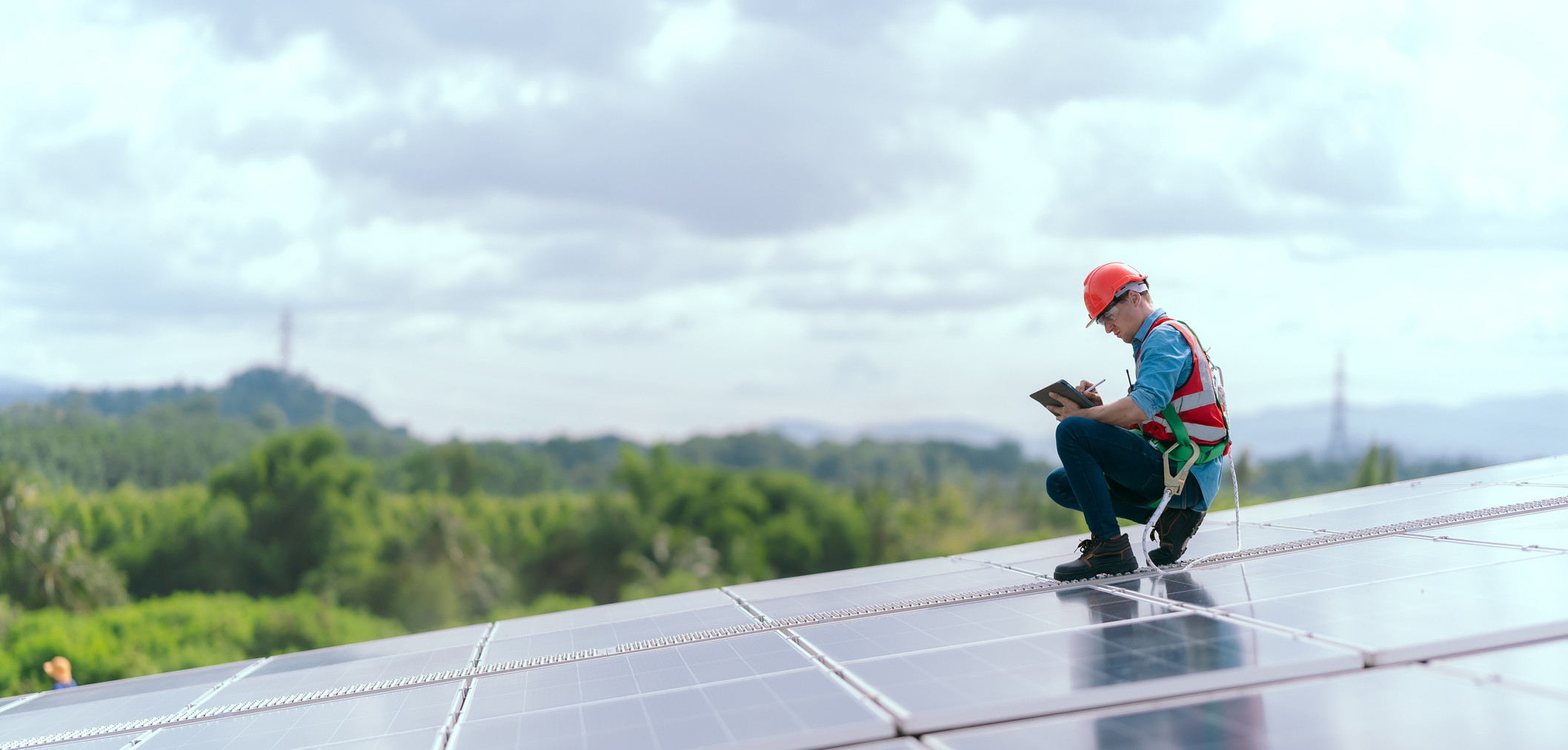Worker on a solar panel