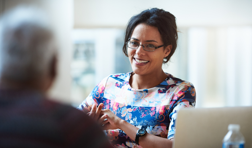 Smiling businesswomen discussing a project