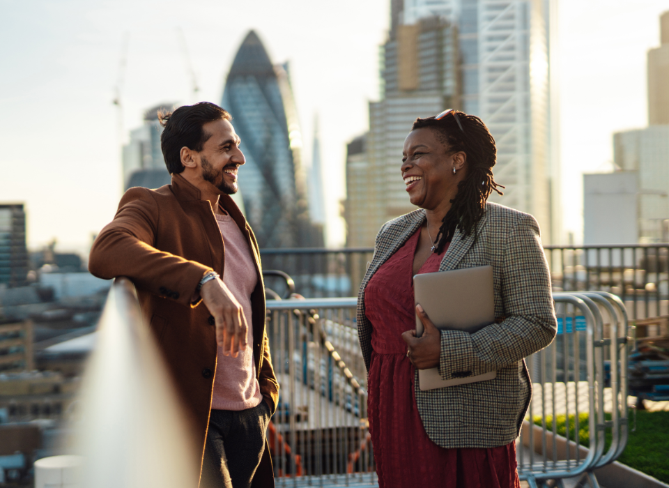 Two people talking in London