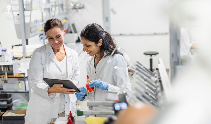 Two people in lab coats