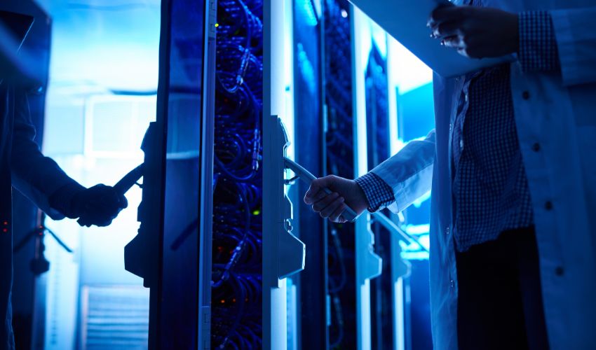 Man opening a unit in a data centre