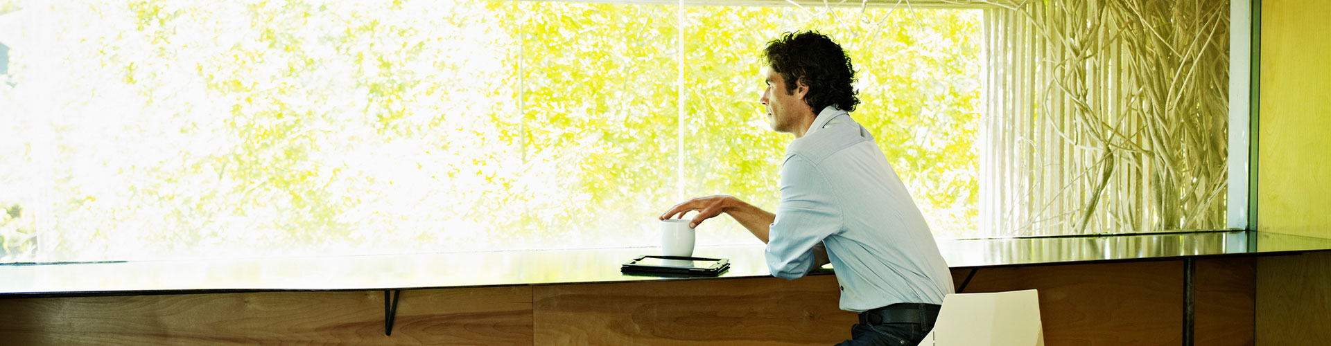 Man looking out of the window