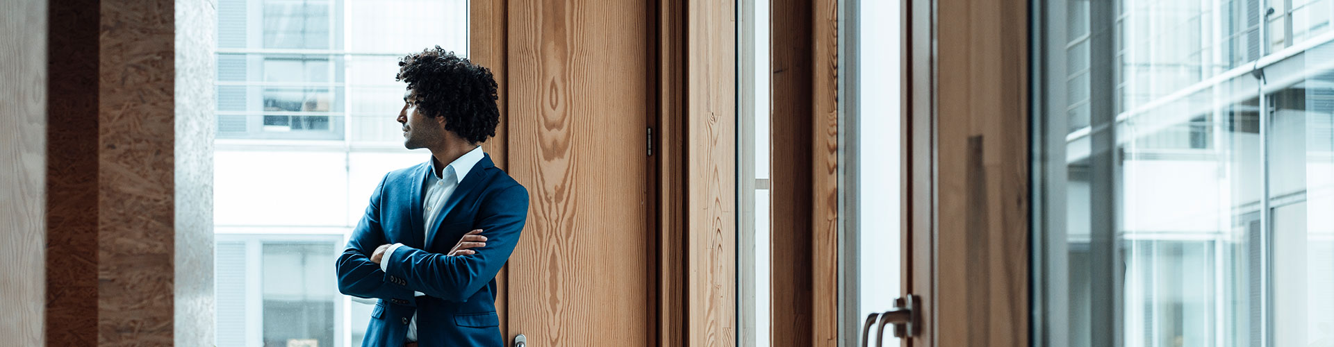 Standing man by the window