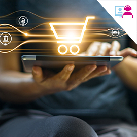 A hand holding a tablet with a shopping trolley symbol above it 