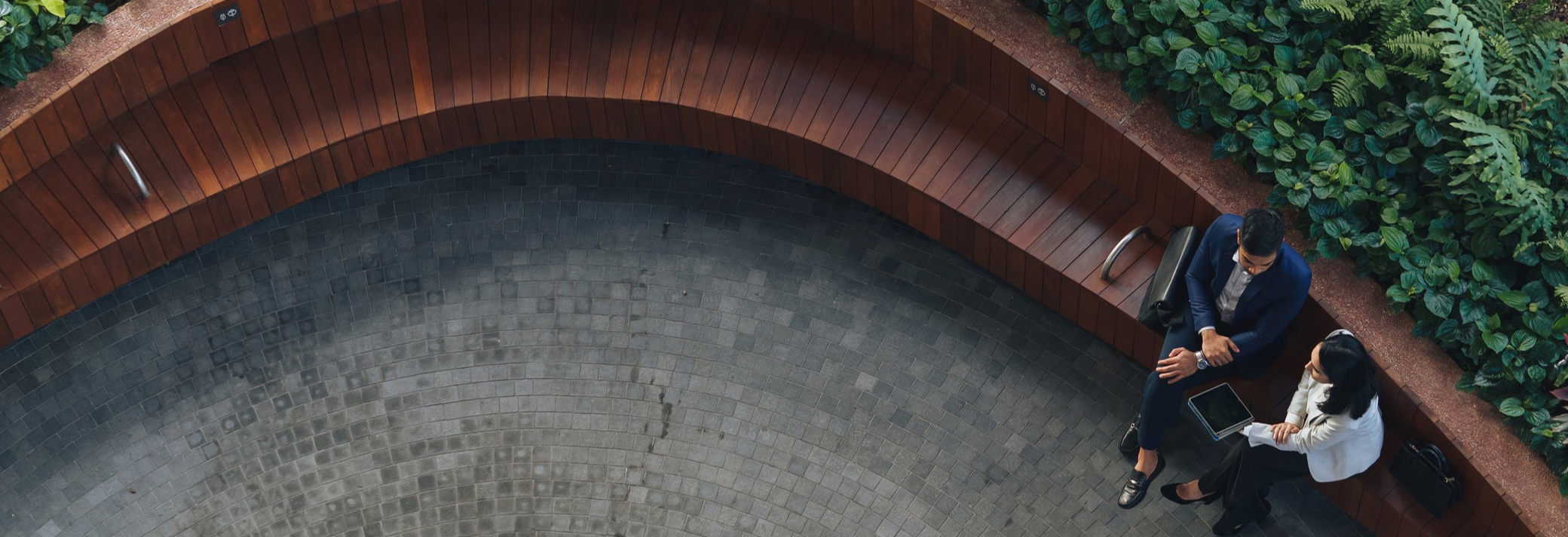 Business people sitting on a bench