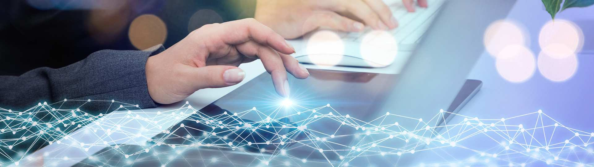 Rays of light shining from the screen where a finger has touched a tablet