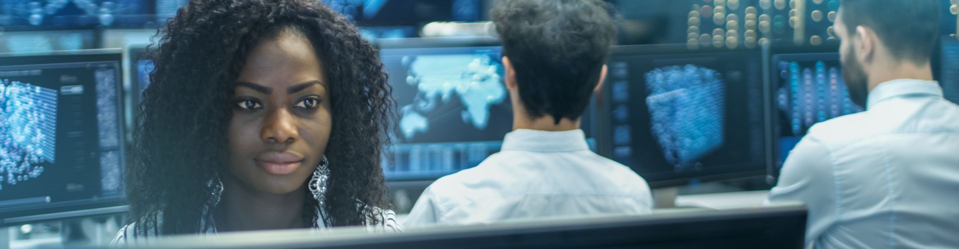 Women reviewing data on a screen