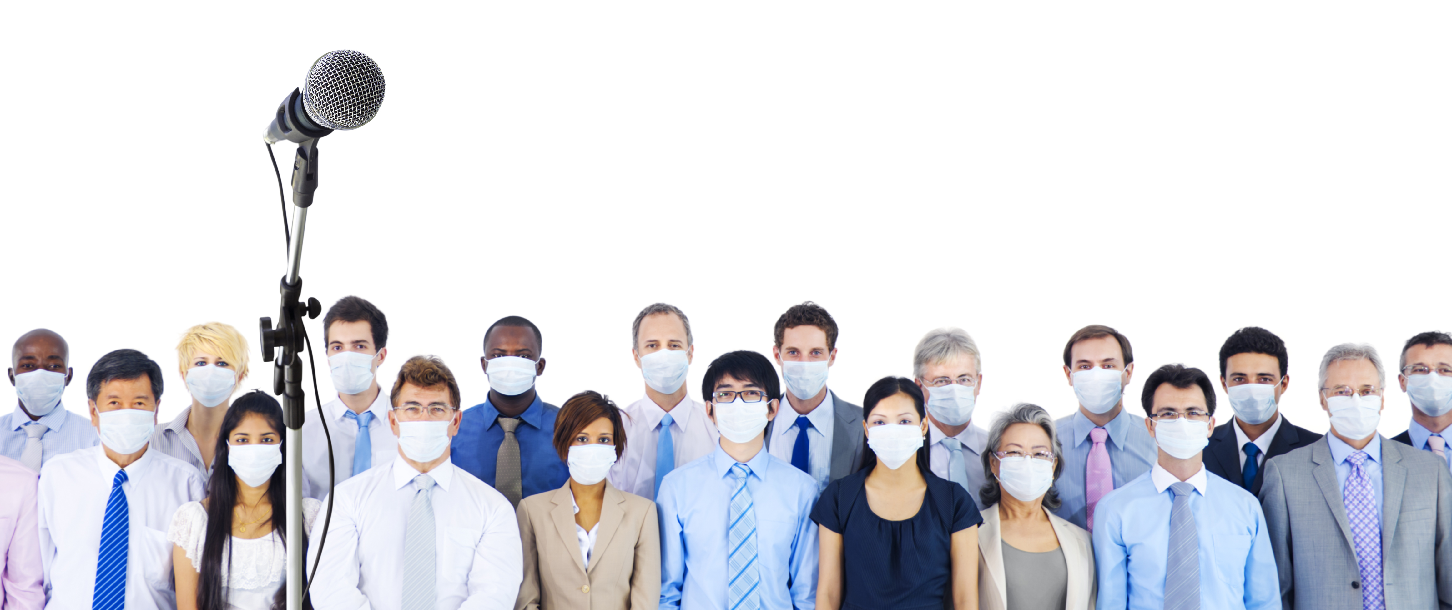 A microphone on a stand in front of professionals wearing facemasks