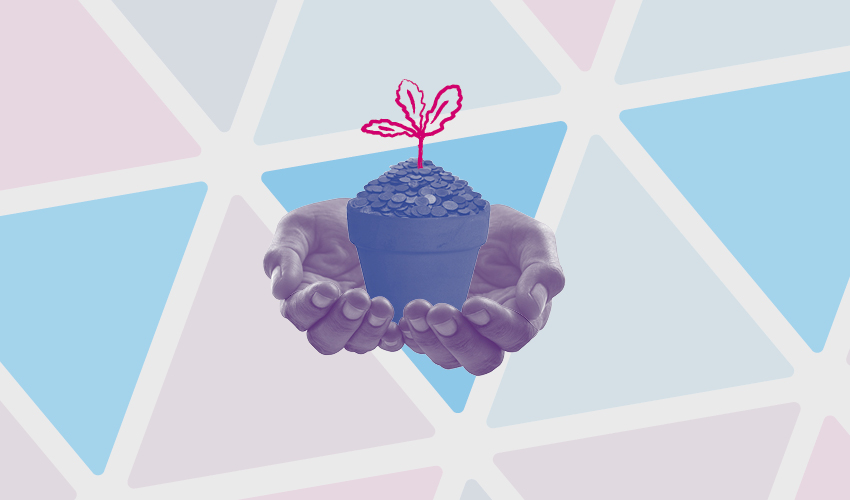 Hands holding a flower pot containing coins