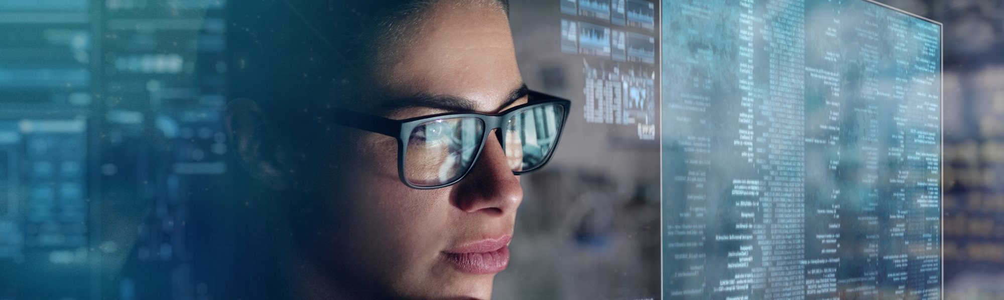 A woman looking at a computer screen