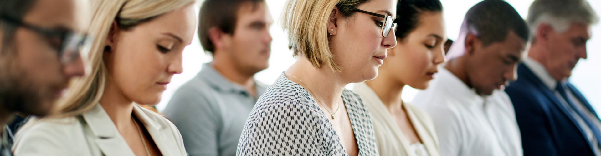 Group of professionals taking notes