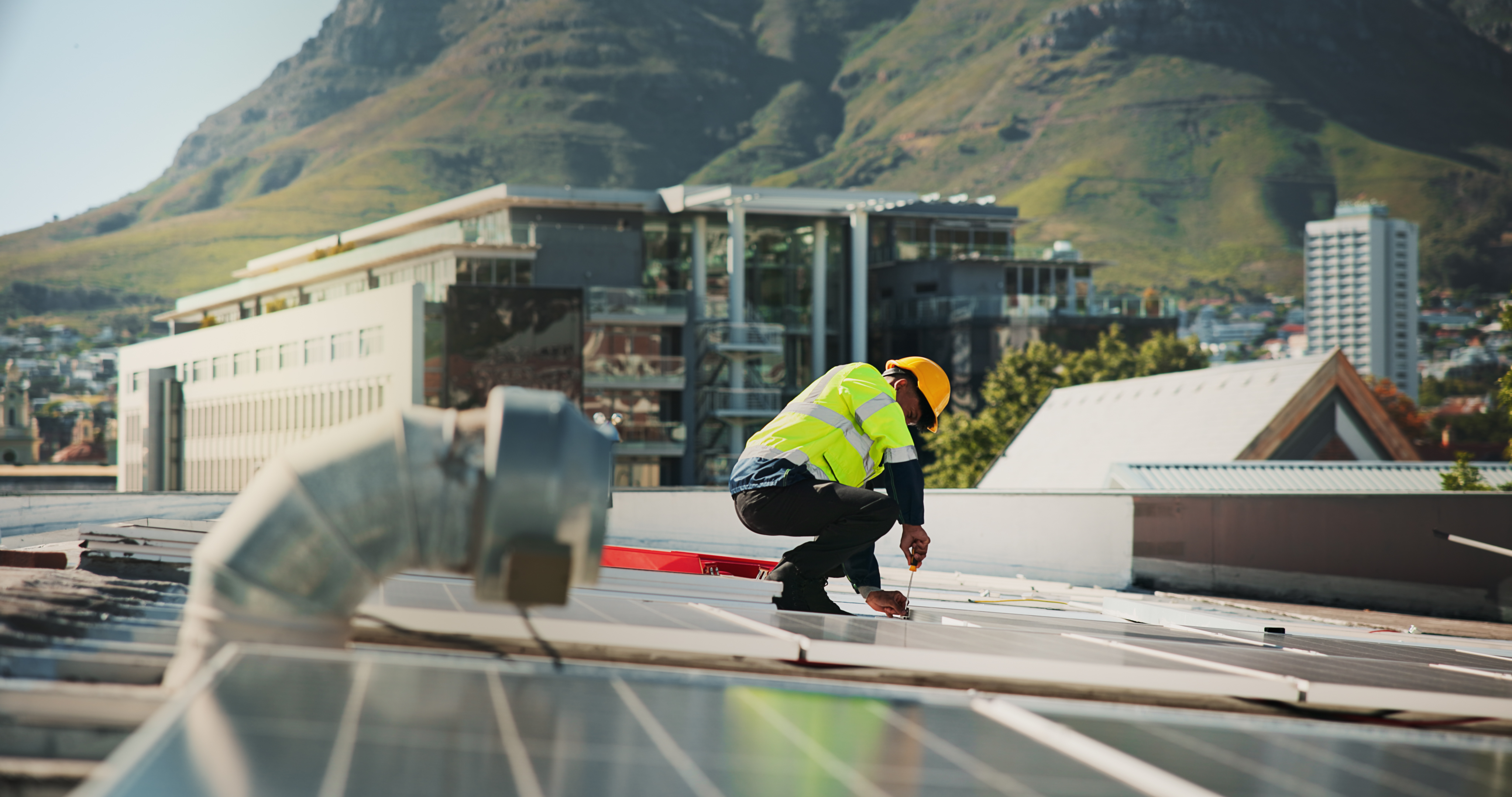 Worker on a solar panel