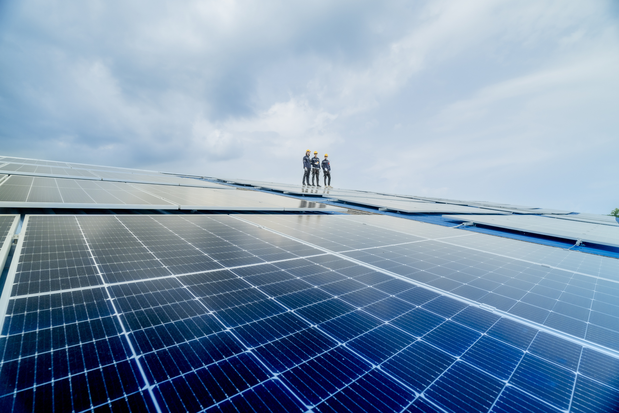 solar workers on solar panels