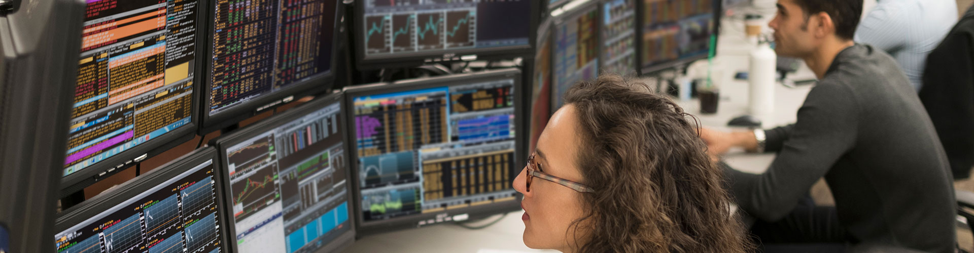 Workers looking at screens