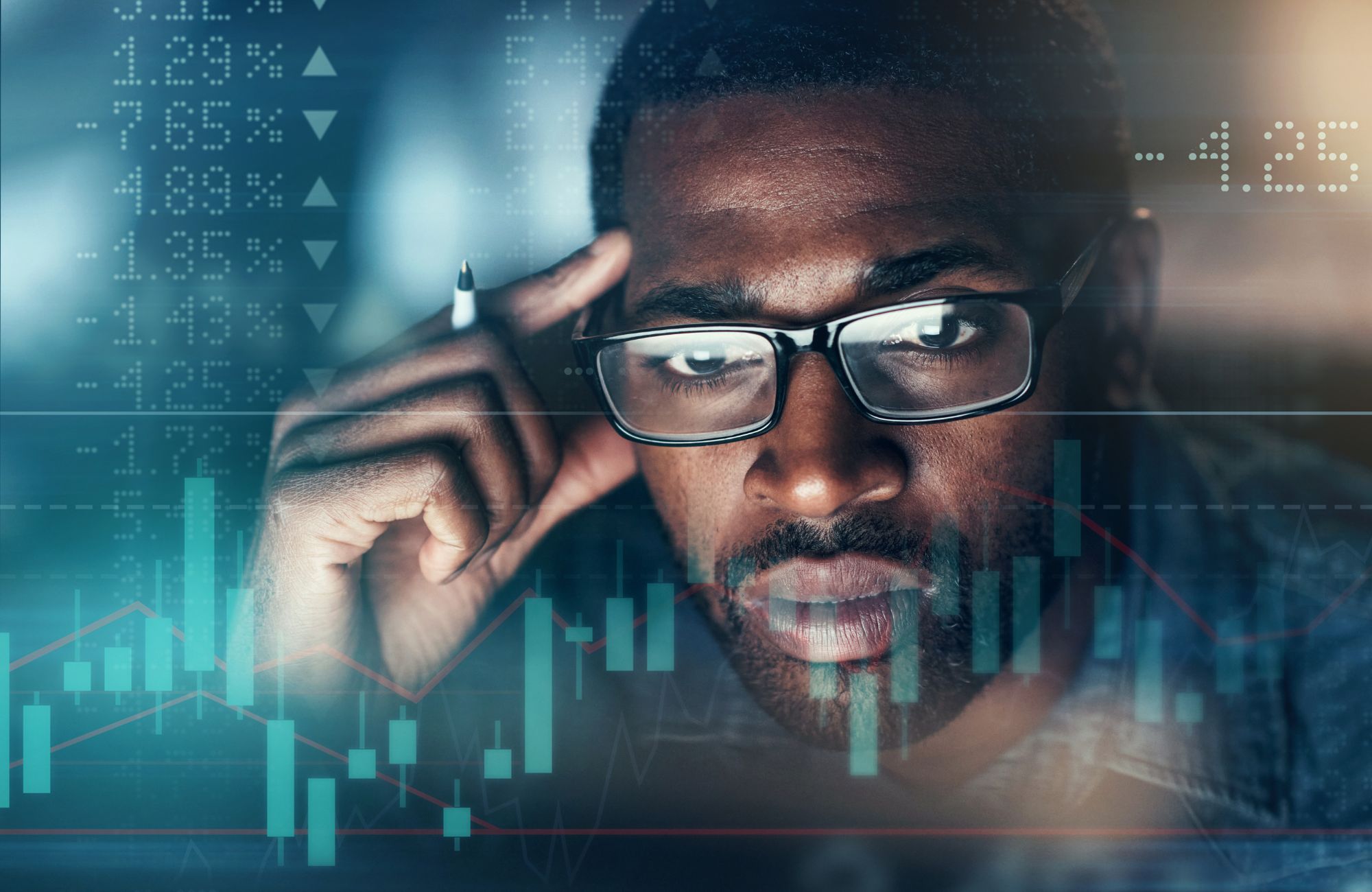 Man looking at graph showing ups and downs of stock market