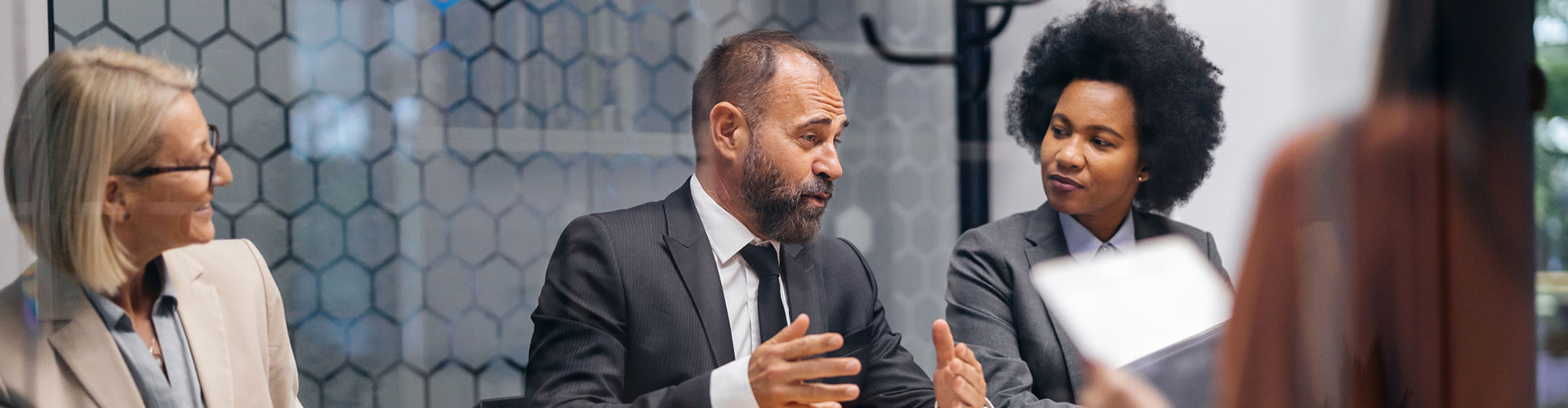 Boardroom meeting with diverse executives